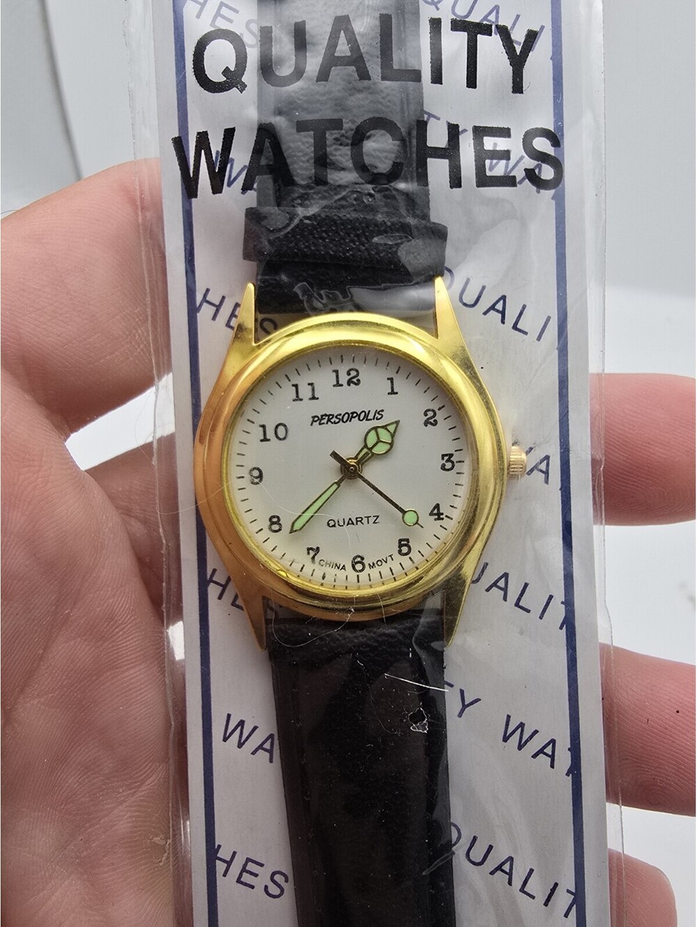 Persopolis Quartz Watch Gold Tone Case Cream Dial Luminous Hands Black Strap